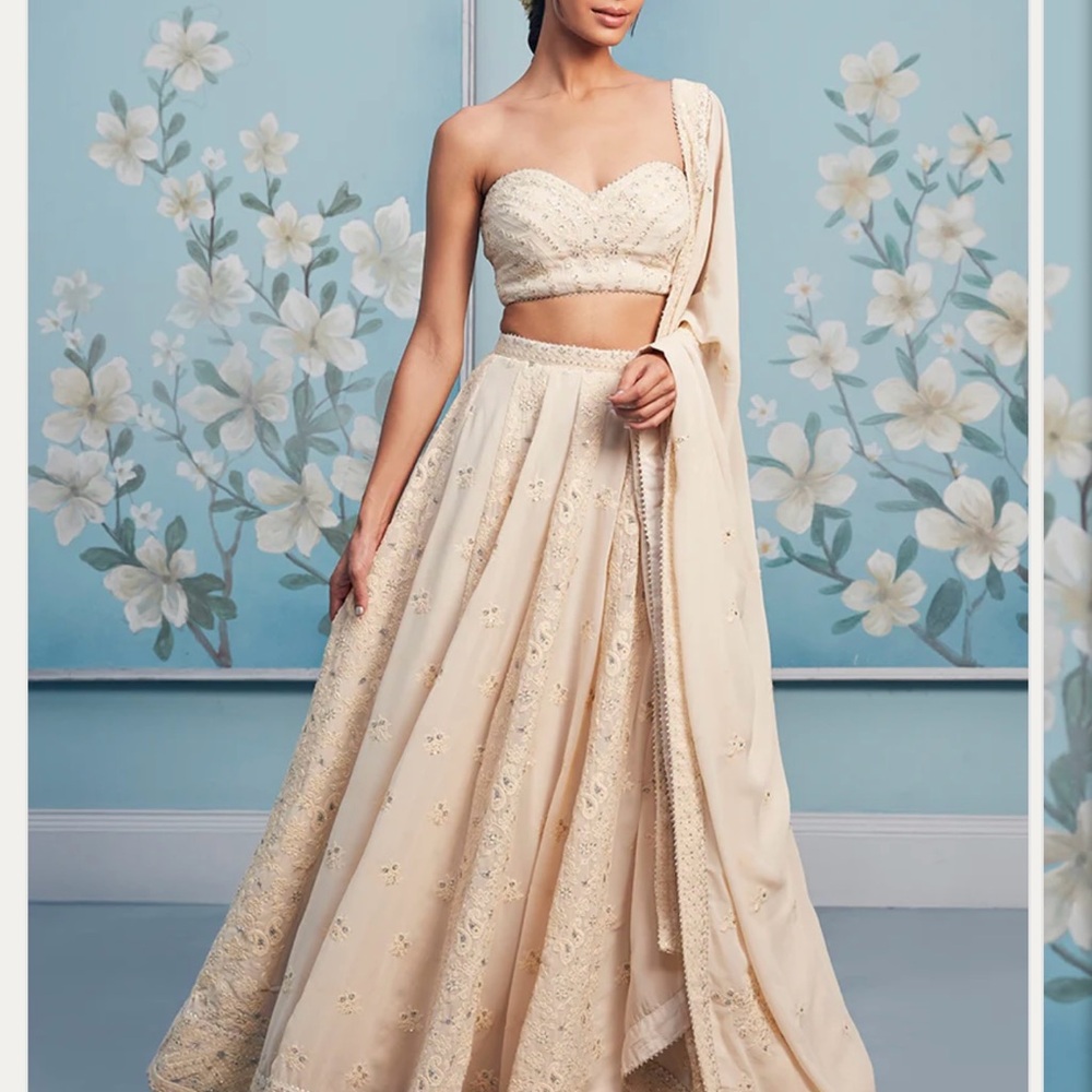 Elegant Cream Embroidered Lehenga Set Lashkaraa